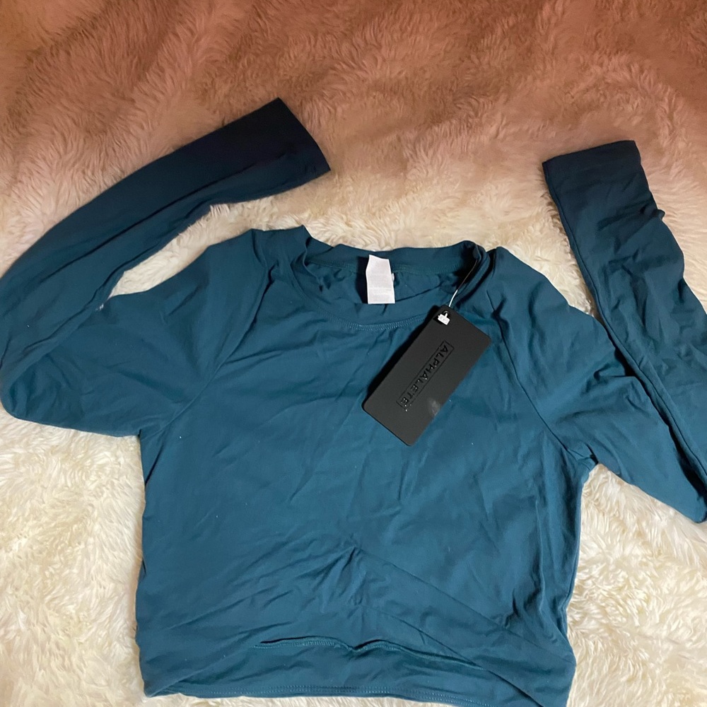Workout croup shirt. Brand new. Smoke free home.